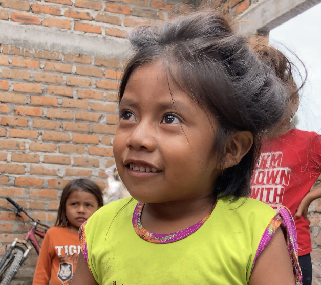 A child supported by Hugs of Love